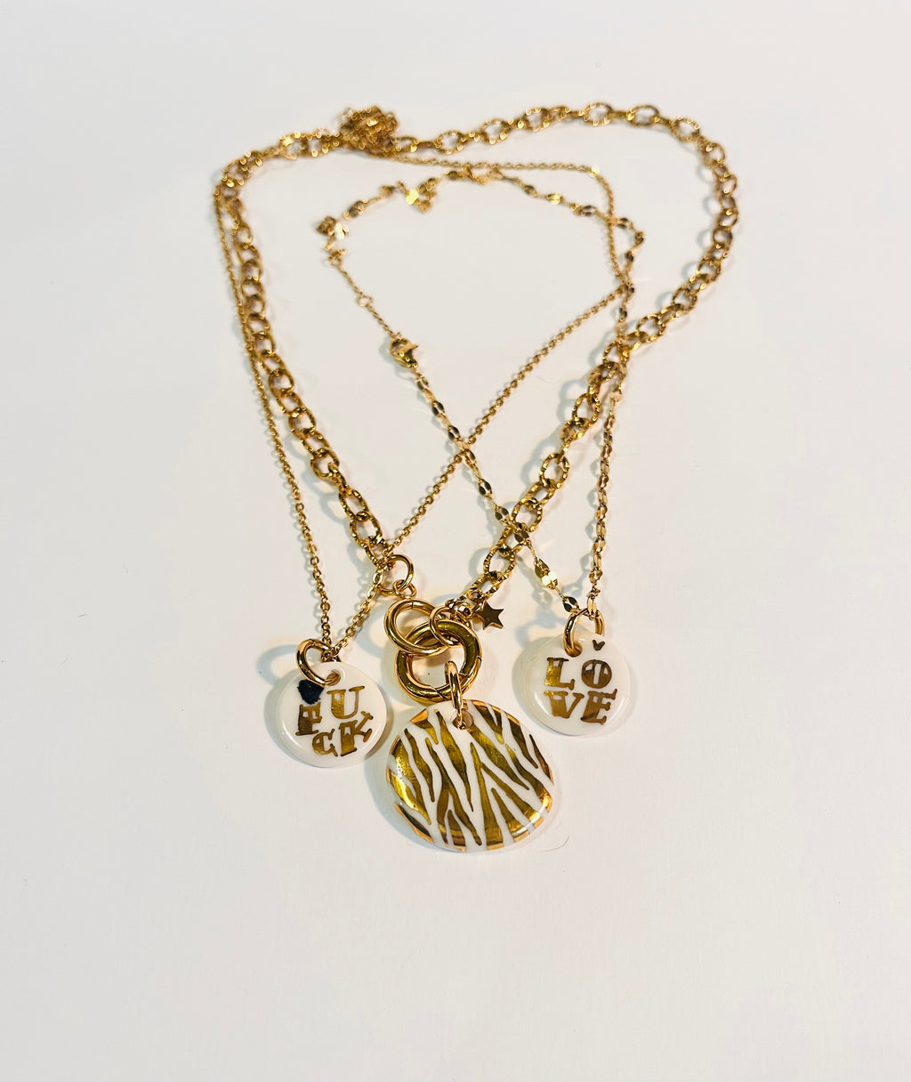 Collier zèbre or porcelaine avec grosse chaîne 